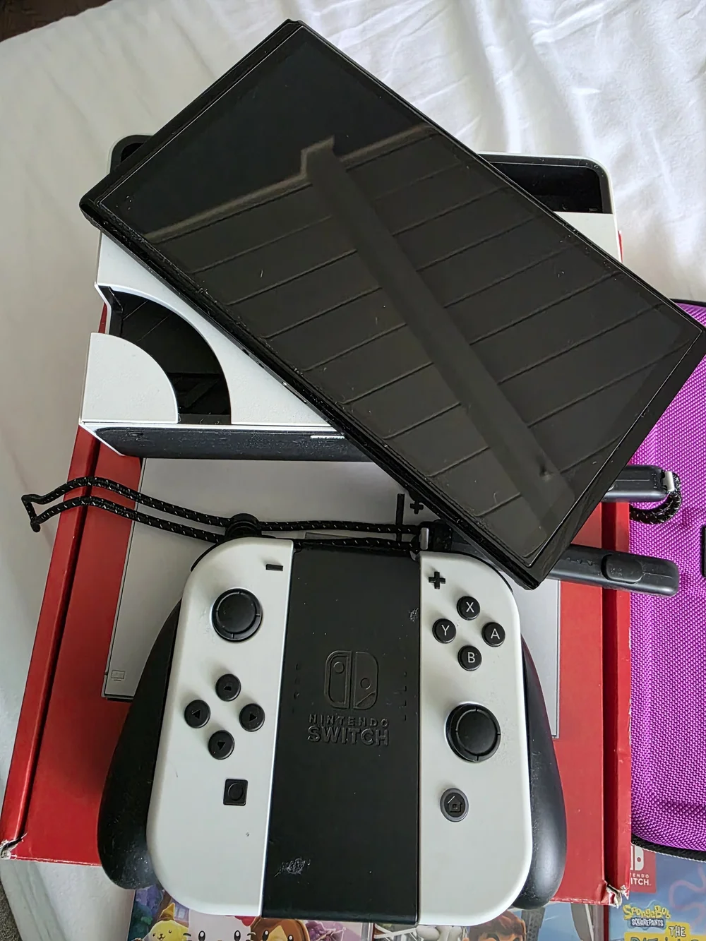 Nintendo Switch OLED White/Black Console with Joy-Con Grip